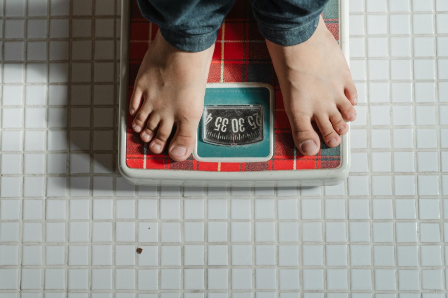feet on weight scale