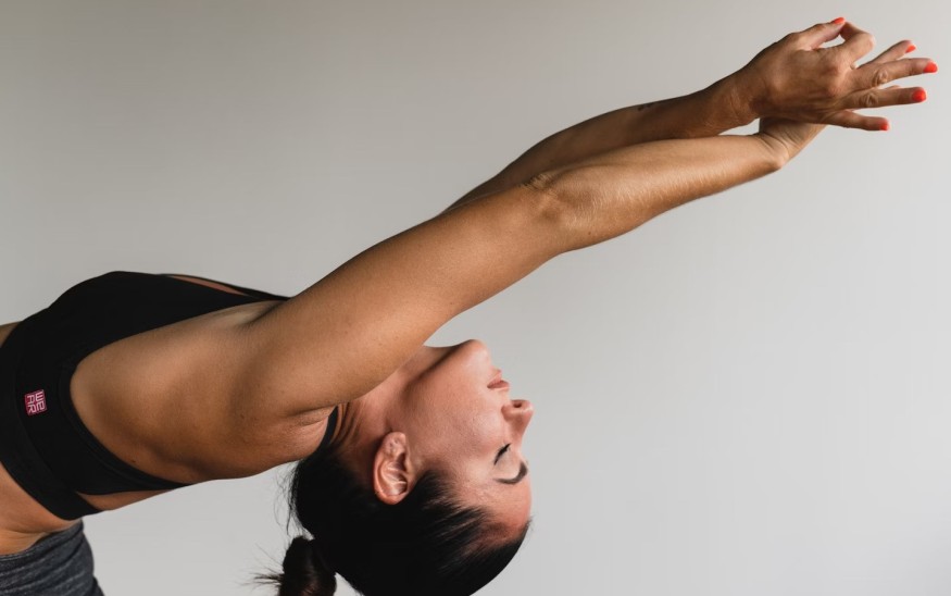 woman stretching her back